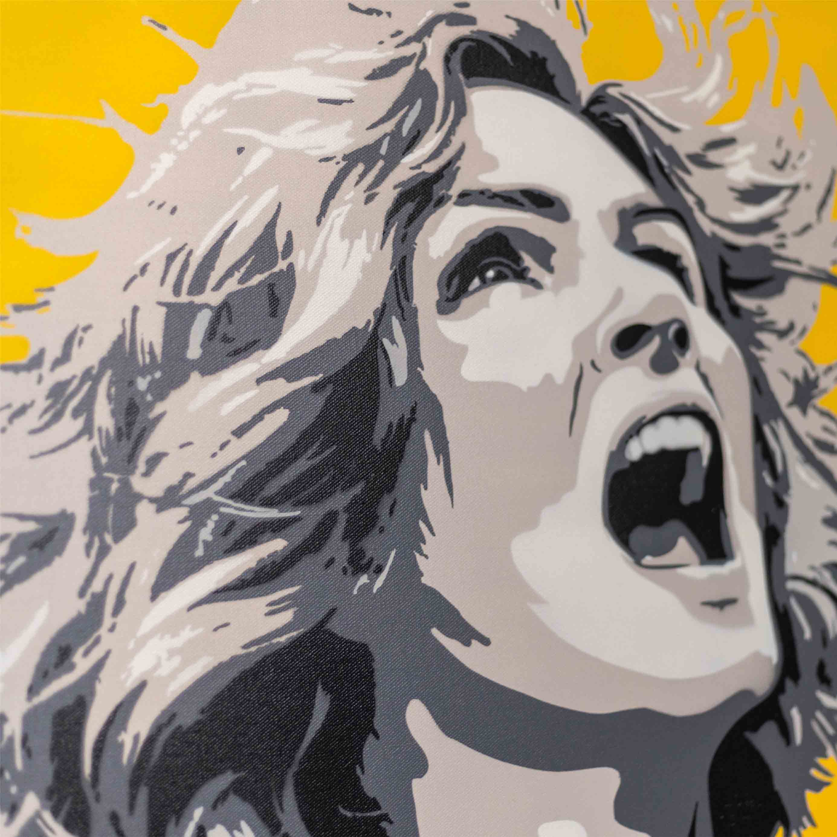 carol from pluribus spray painting with yellow background