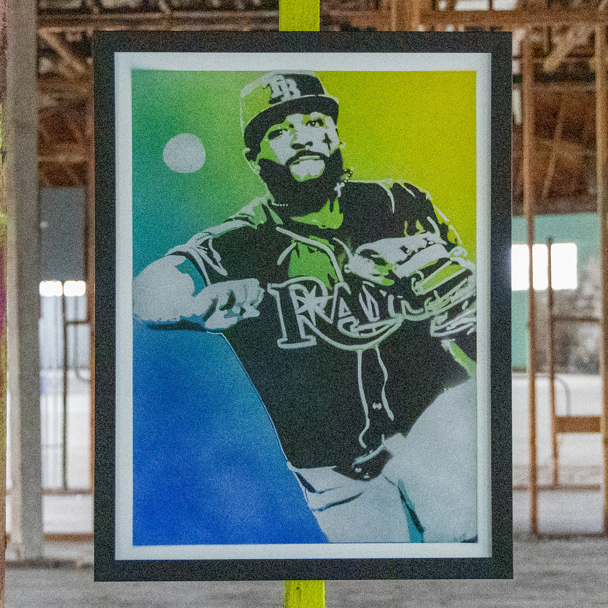 Junior Caminero Tampa Bay Rays hand-sprayed stencil art, navy jersey over a blue-to-lime fade, framed in black, one-of-one Layered Original by Made By Cito