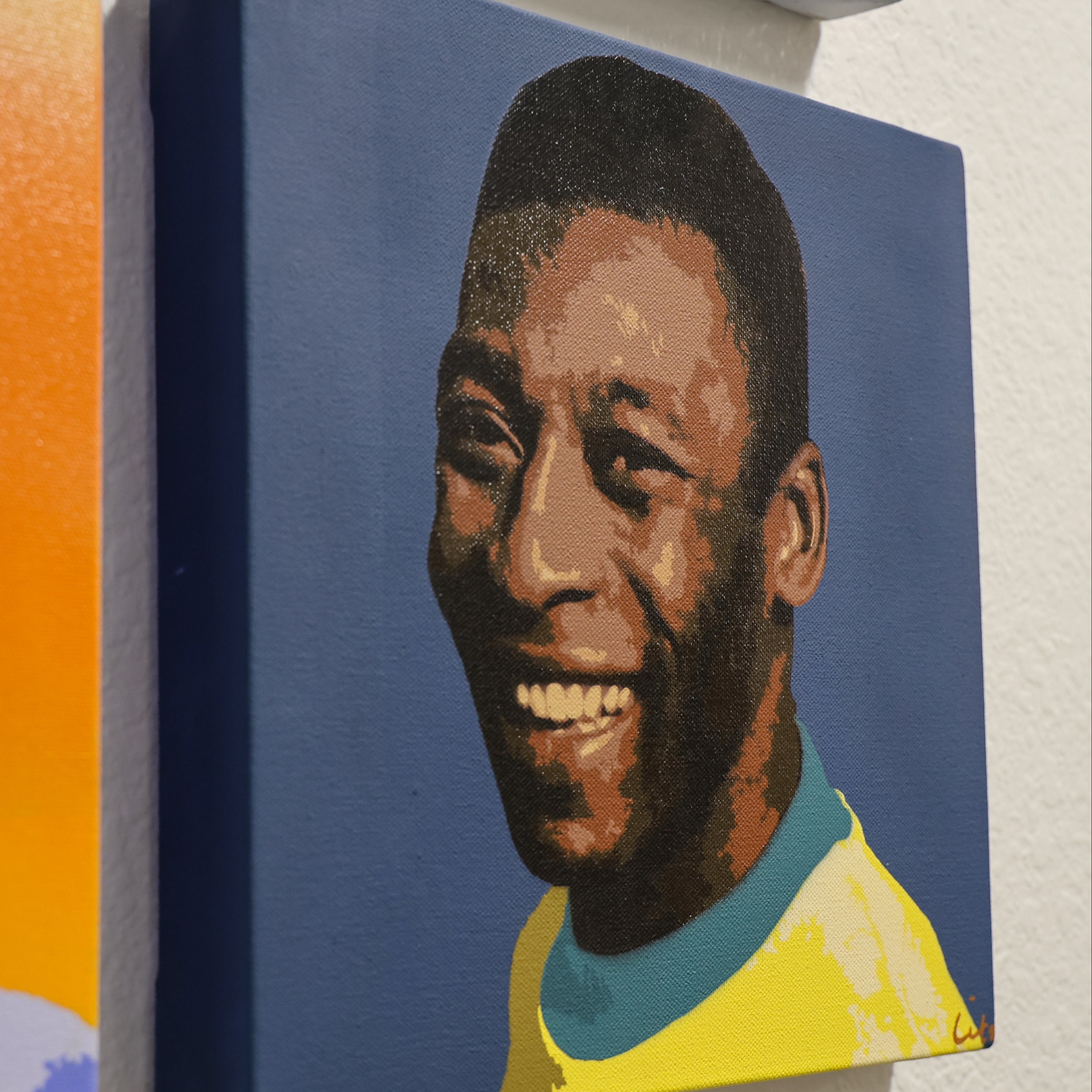 pele art canvas on wall