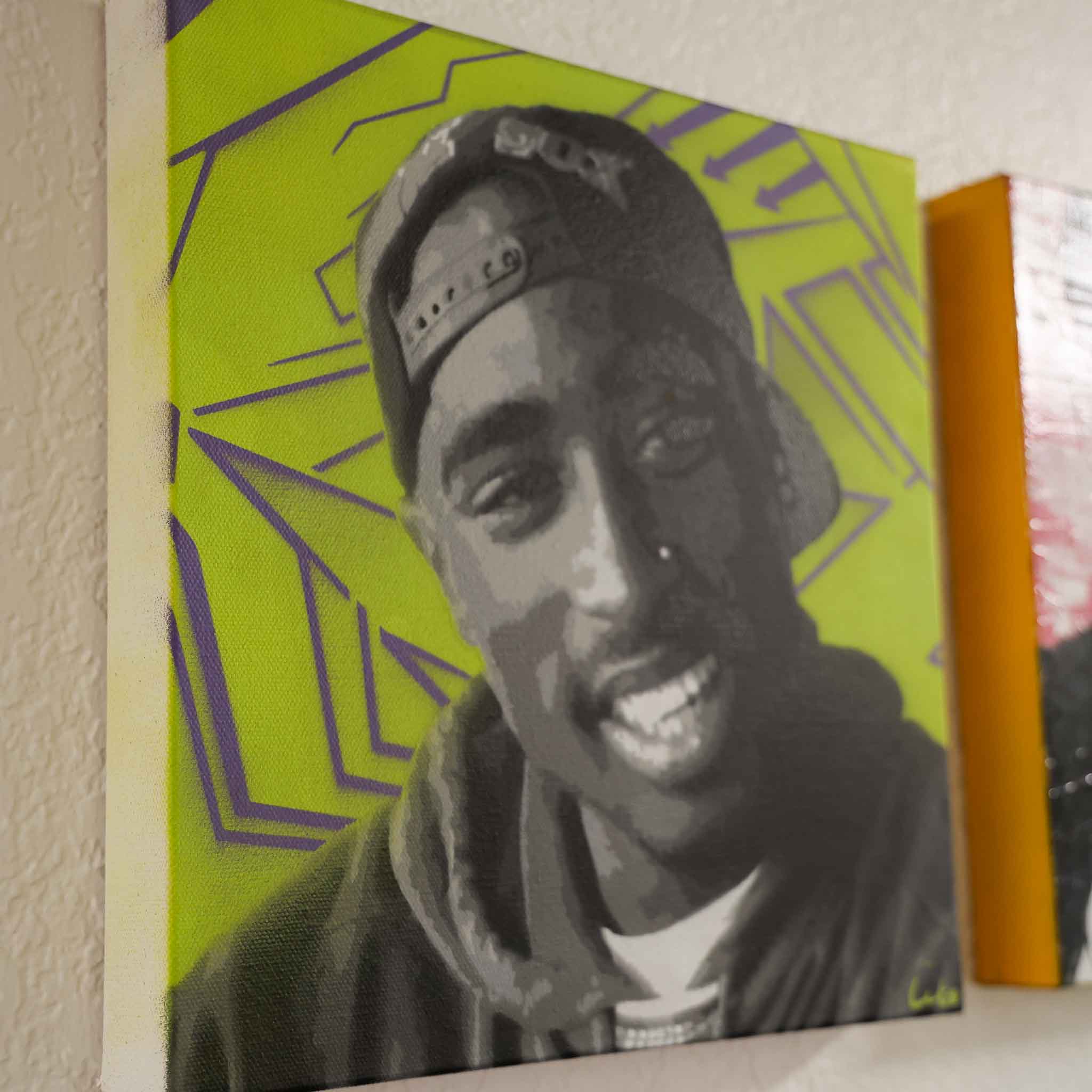 tupac lime green painting on wall
